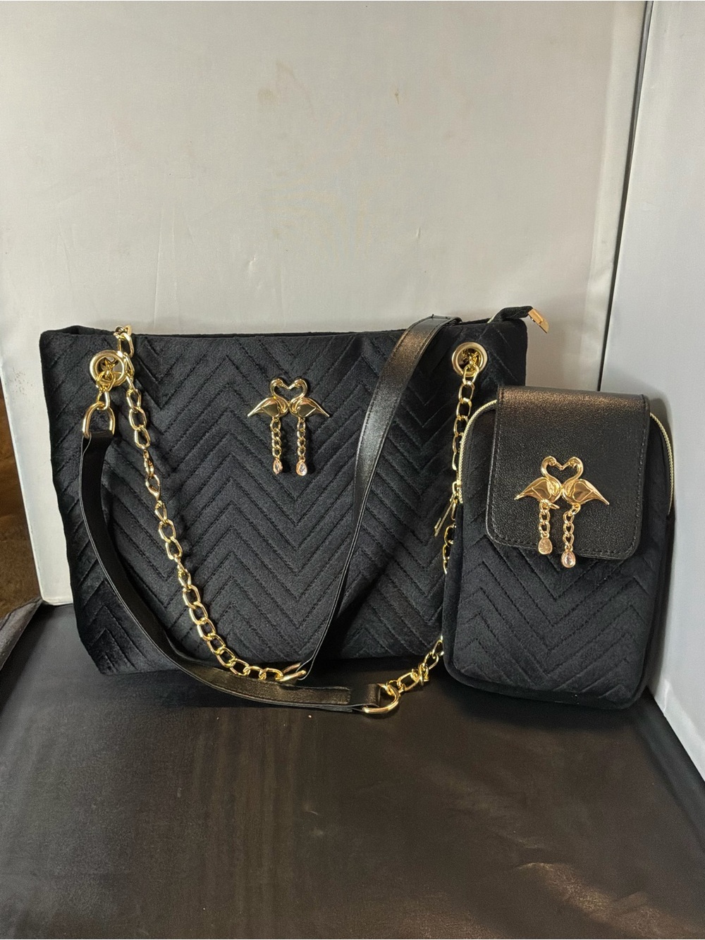 Black Quilted Shoulder Bag with Gold Chain Accents - Picture 2 of 3